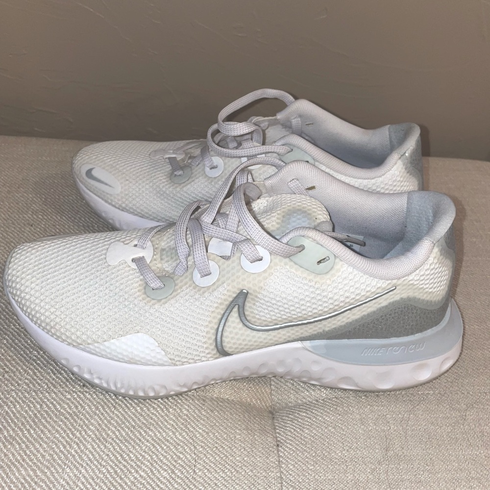 White and silver Nike renew